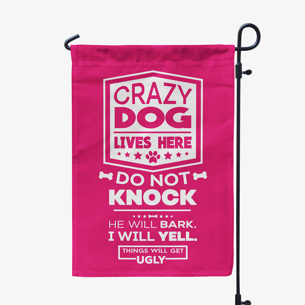 pink garden flag with text "crazy dog lives here, do not knock, he will bark, I will yell, things will get ugly"