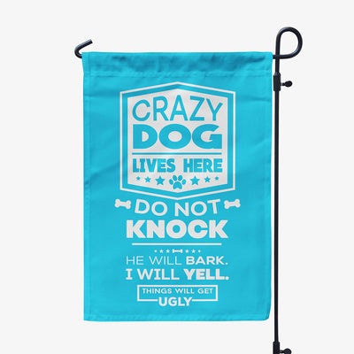 blue garden flag with text "crazy dog lives here, do not knock, he will bark, I will yell, things will get ugly"