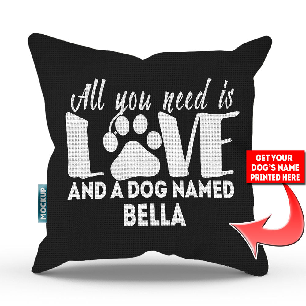 black colored pillow with text "all you need is love and a dog named bella"