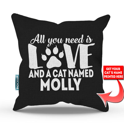 black colored pillow with text "all you need is love and a cat named molly"