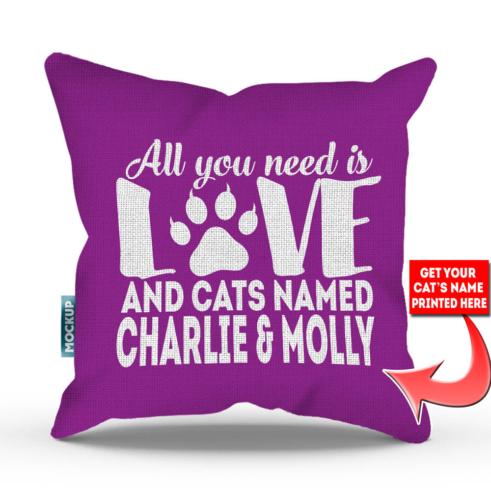 purple colored pillow with text "all you need is love and cats named charlie and molly"