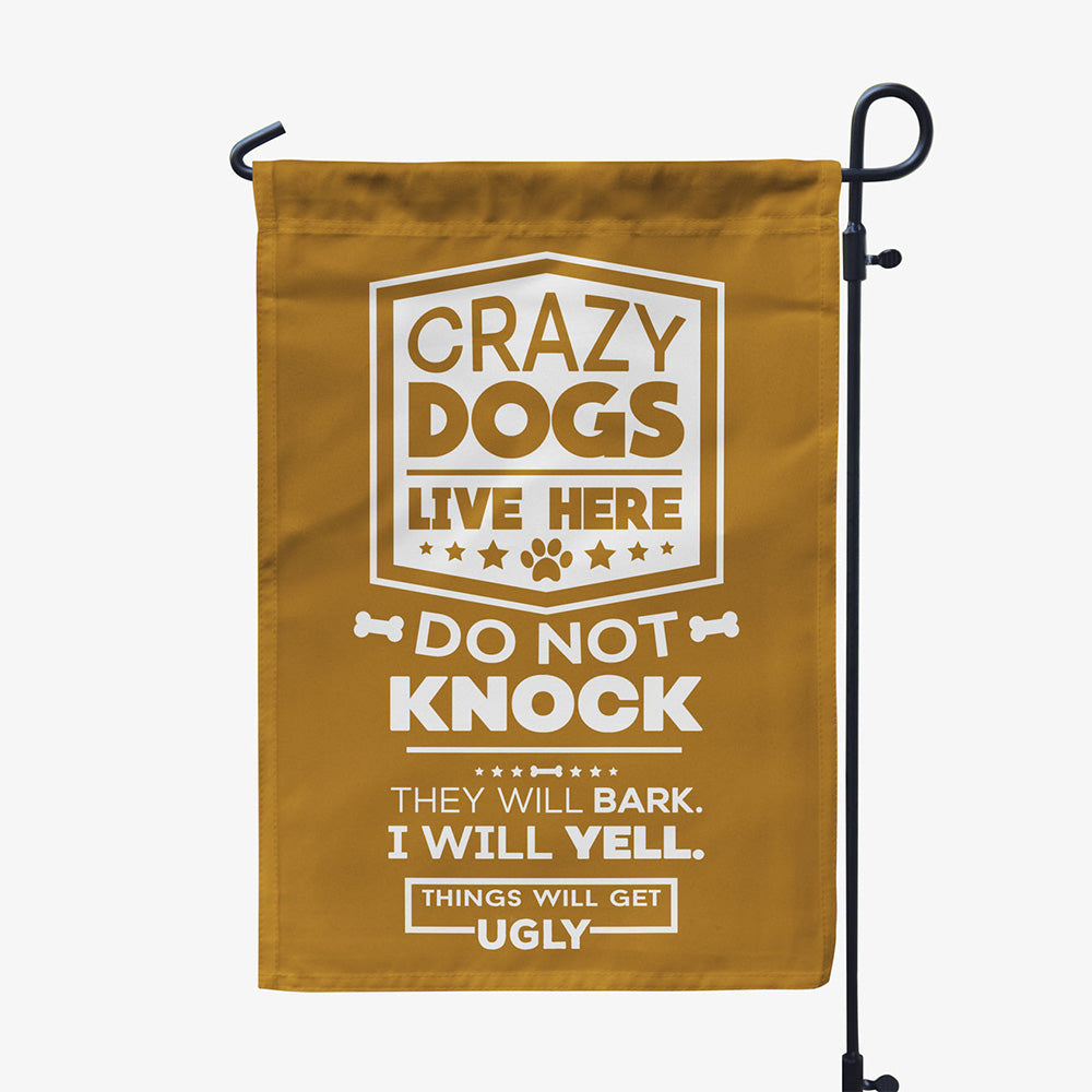 brown garden flag with text "crazy dogs live here, do not knock, they will bark, I will yell, things will get ugly"