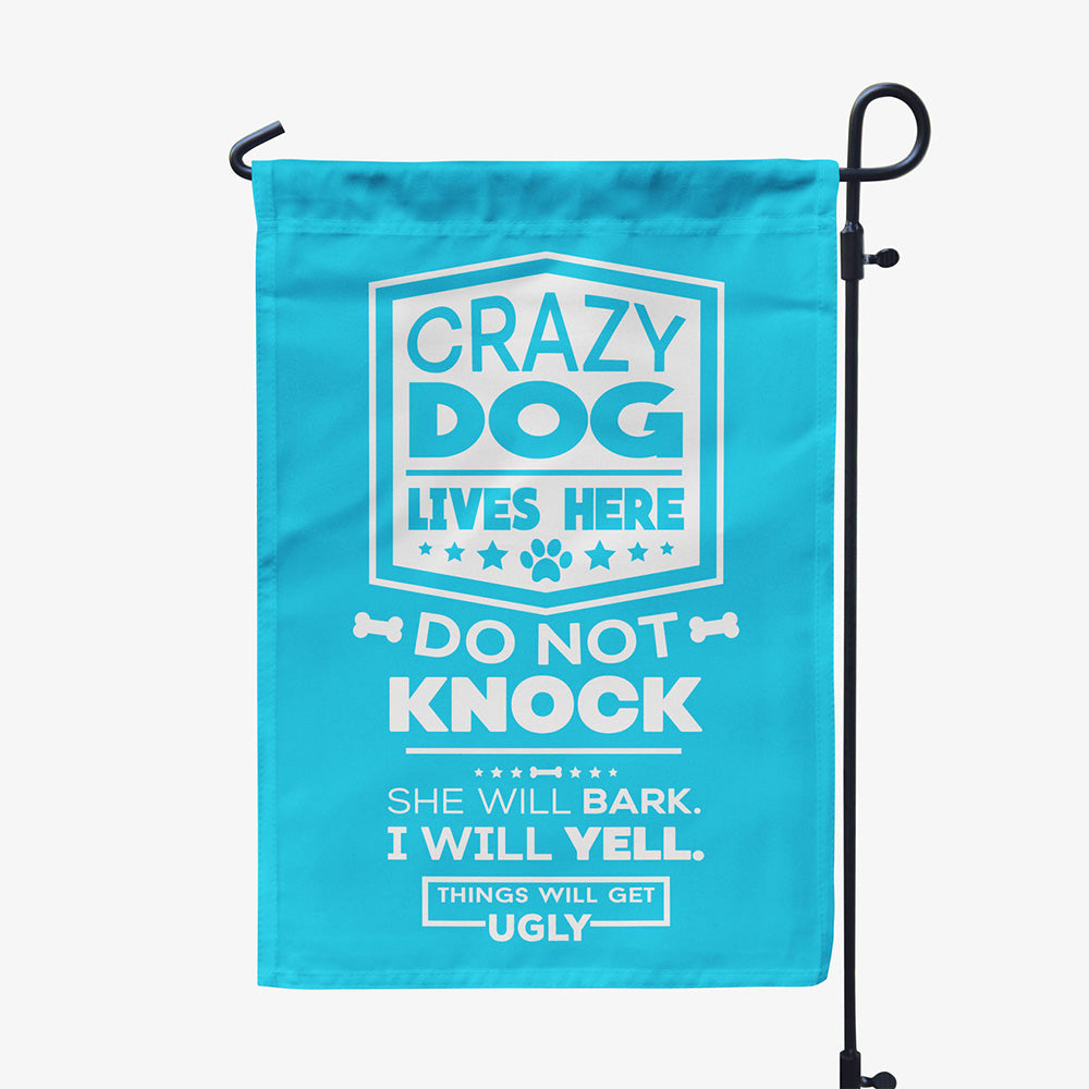 blue garden flag with text "crazy dog lives here, do not knock, she will bark, I will yell, things will get ugly"