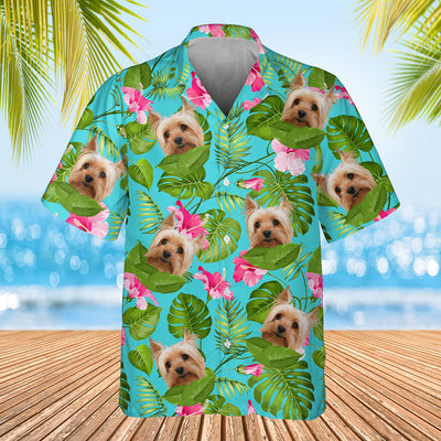 light blue palm leaf themed shirt with dogs