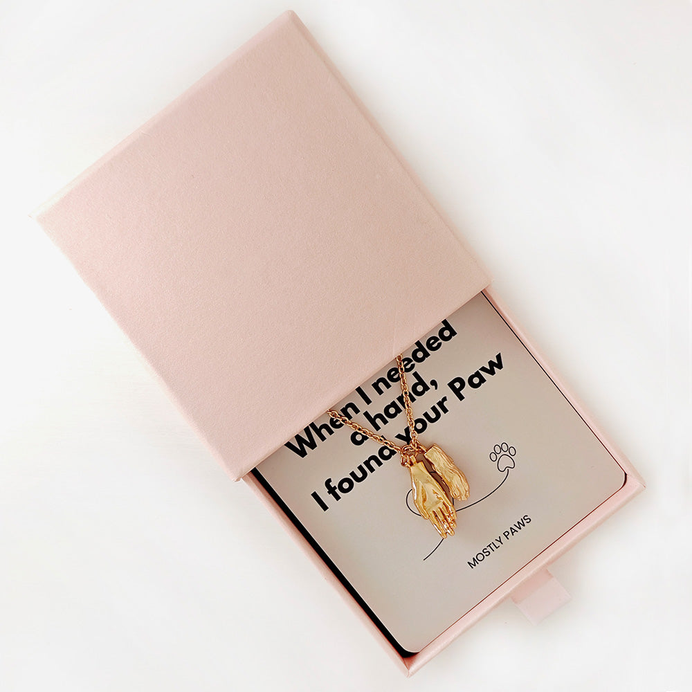 Forever Connected – Paw in Hand Pendant Necklace