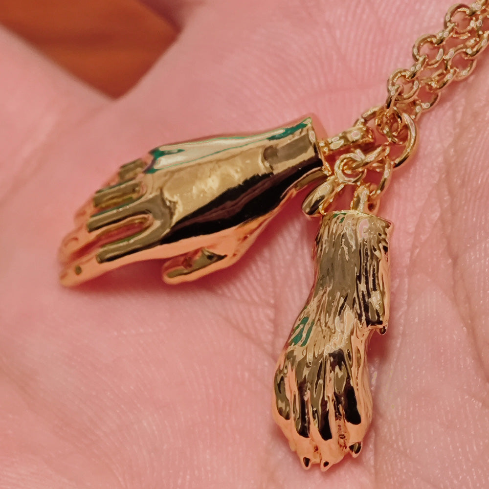Forever Connected – Paw in Hand Pendant Necklace