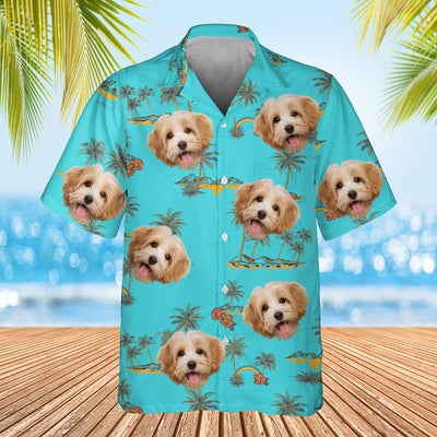 light blue palm tree themed shirt with dogs