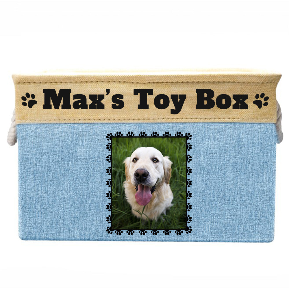 Light Blue toy box with text "Max's toy box", image of dog in rectangular frame on toy box