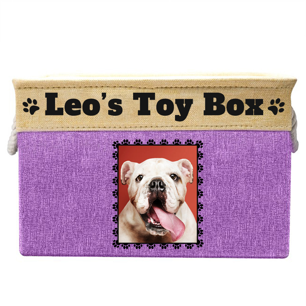 Purple toy box with text "leo's toy box", image of dog in rectangular frame on toy box
