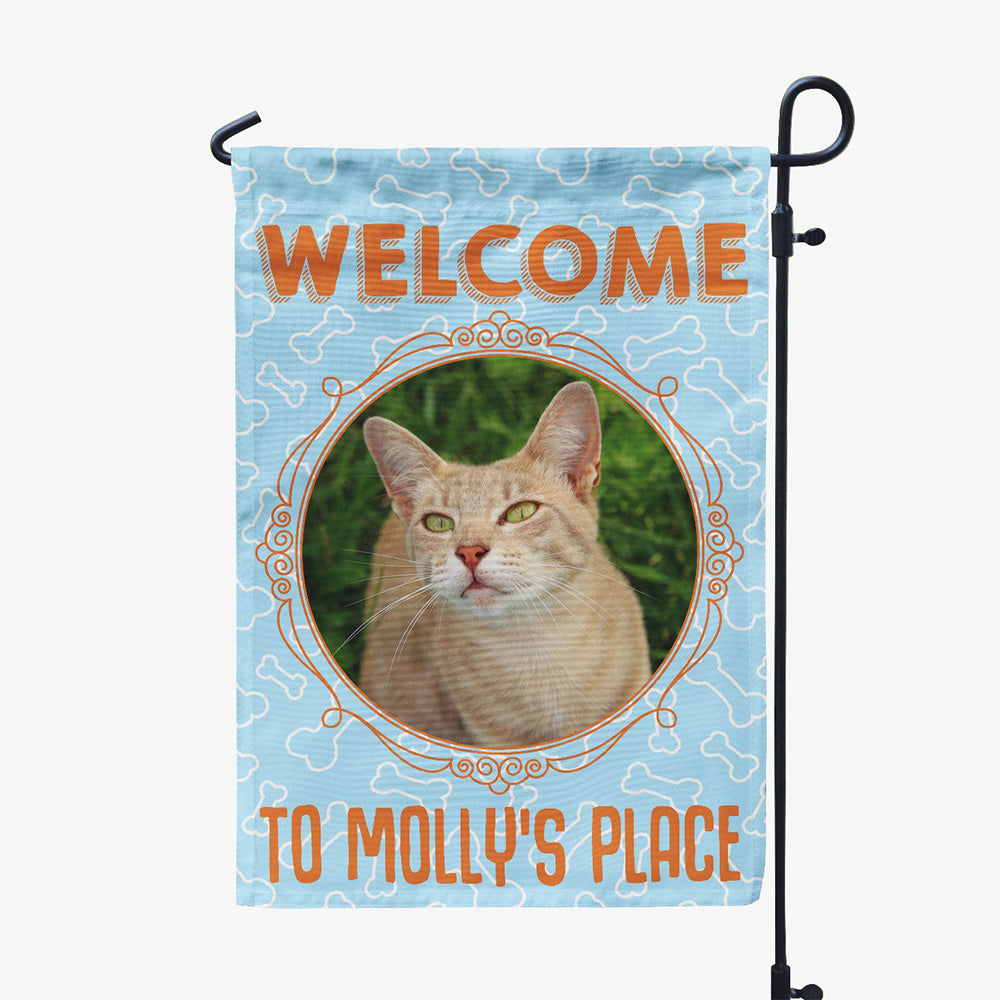 blue garden flag with text "welcome to molly&