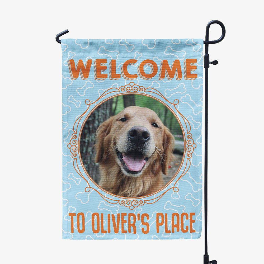 blue garden flag with text "welcome to oliver&