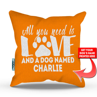 orange colored pillow with text "all you need is love and a dog named charlie"