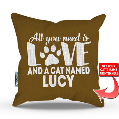 golden brown colored pillow with text "all you need is love and a cat named lucy"