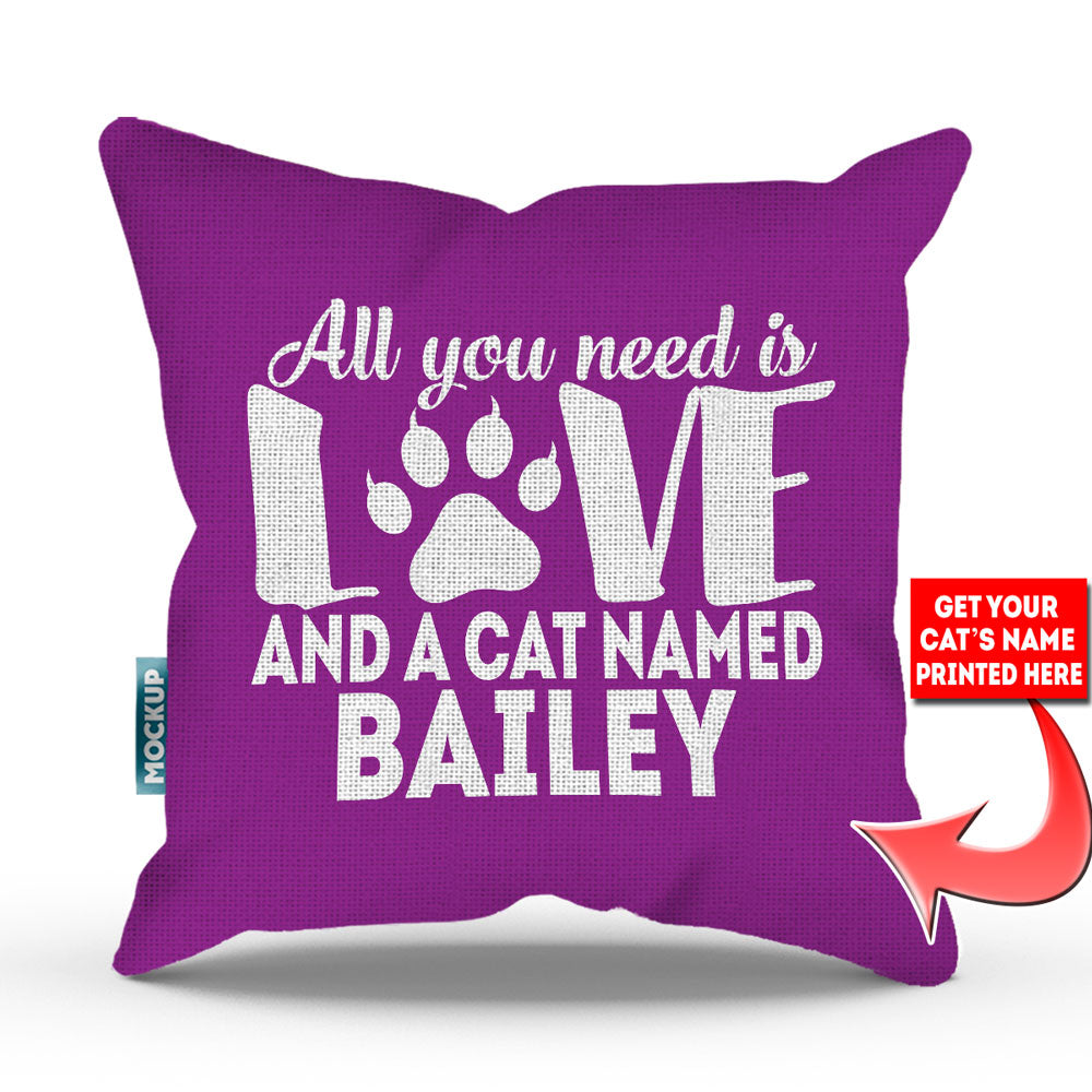 purple colored pillow with text "all you need is love and a cat named bailey"
