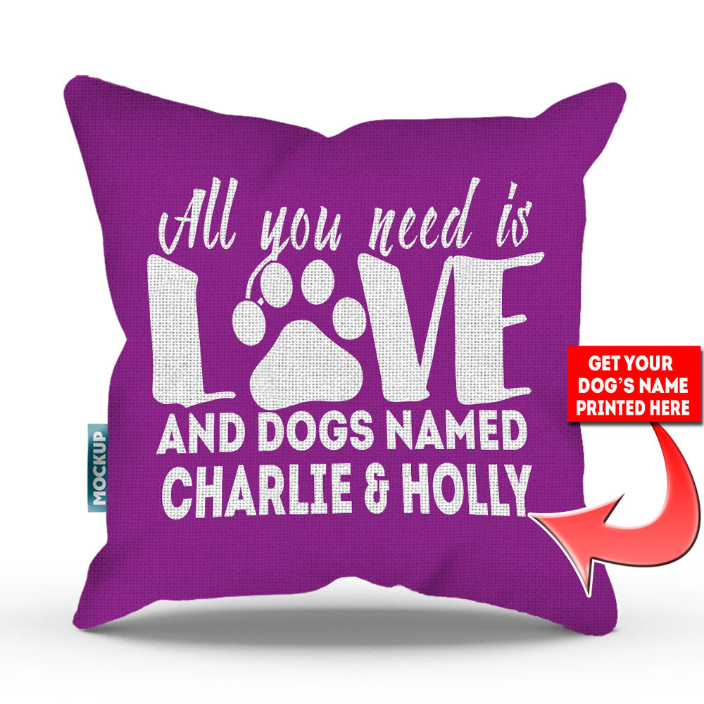 purple colored pillow with text "all you need is love and dogs named charlie and holly"