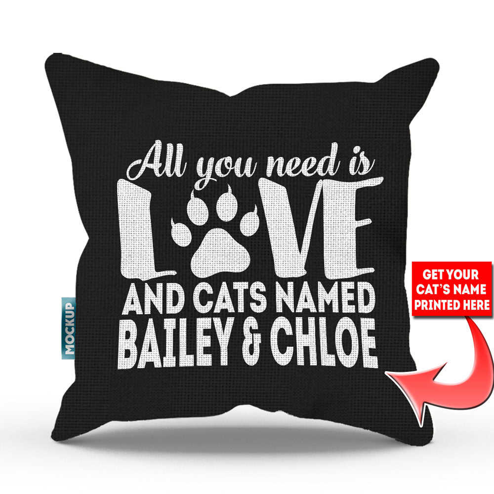 black colored pillow with text "all you need is love and cats named bailey and chloe"