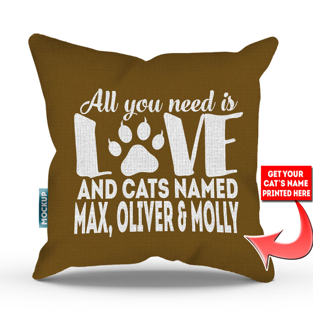 golden brown colored pillow with text "all you need is love and cats named max, oliver, and molly"