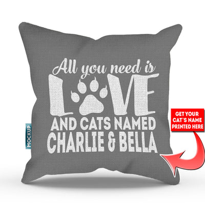 grey colored pillow with text "all you need is love and cats named charlie and bella"