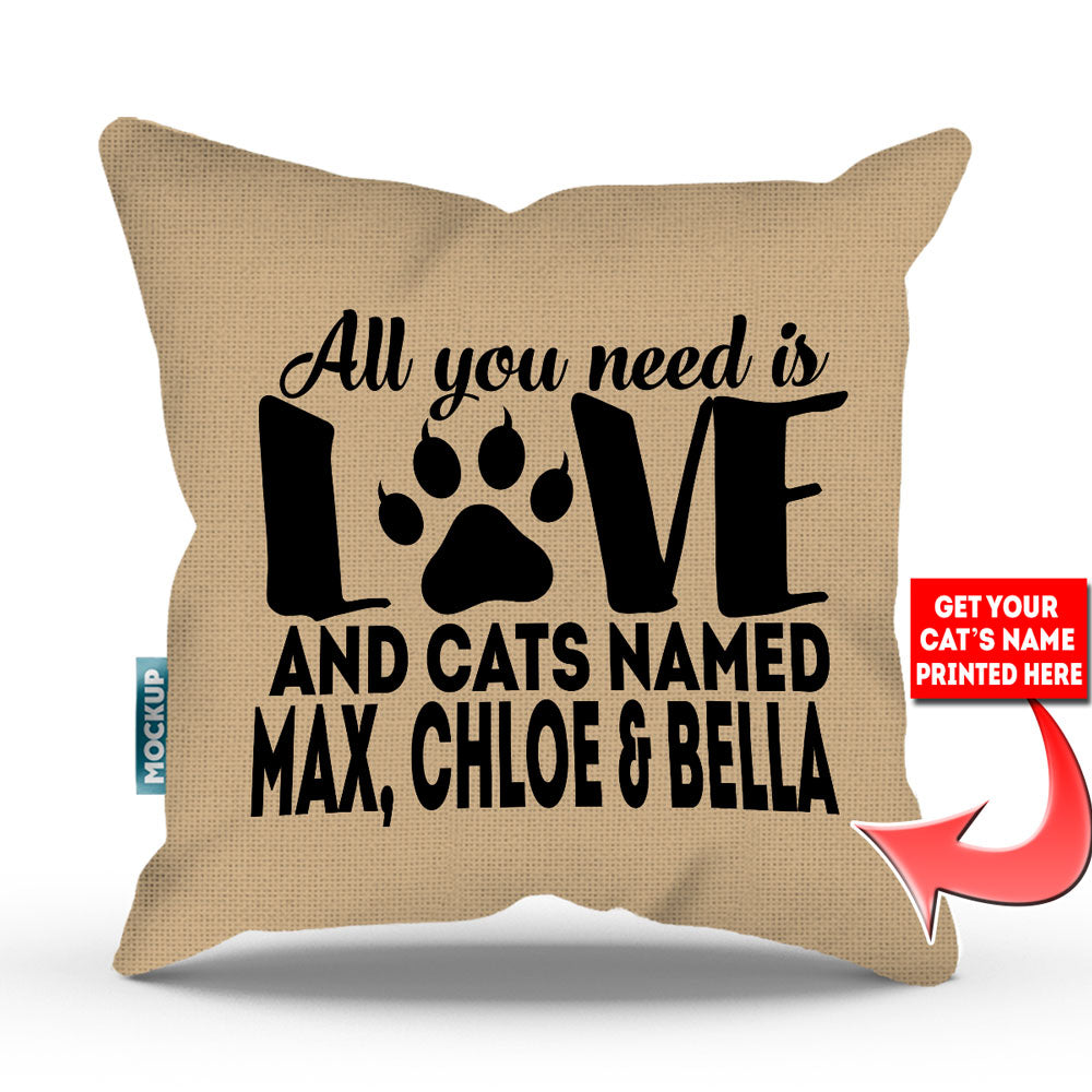 tan colored pillow with text "all you need is love and cats named max, chloe, and bella"