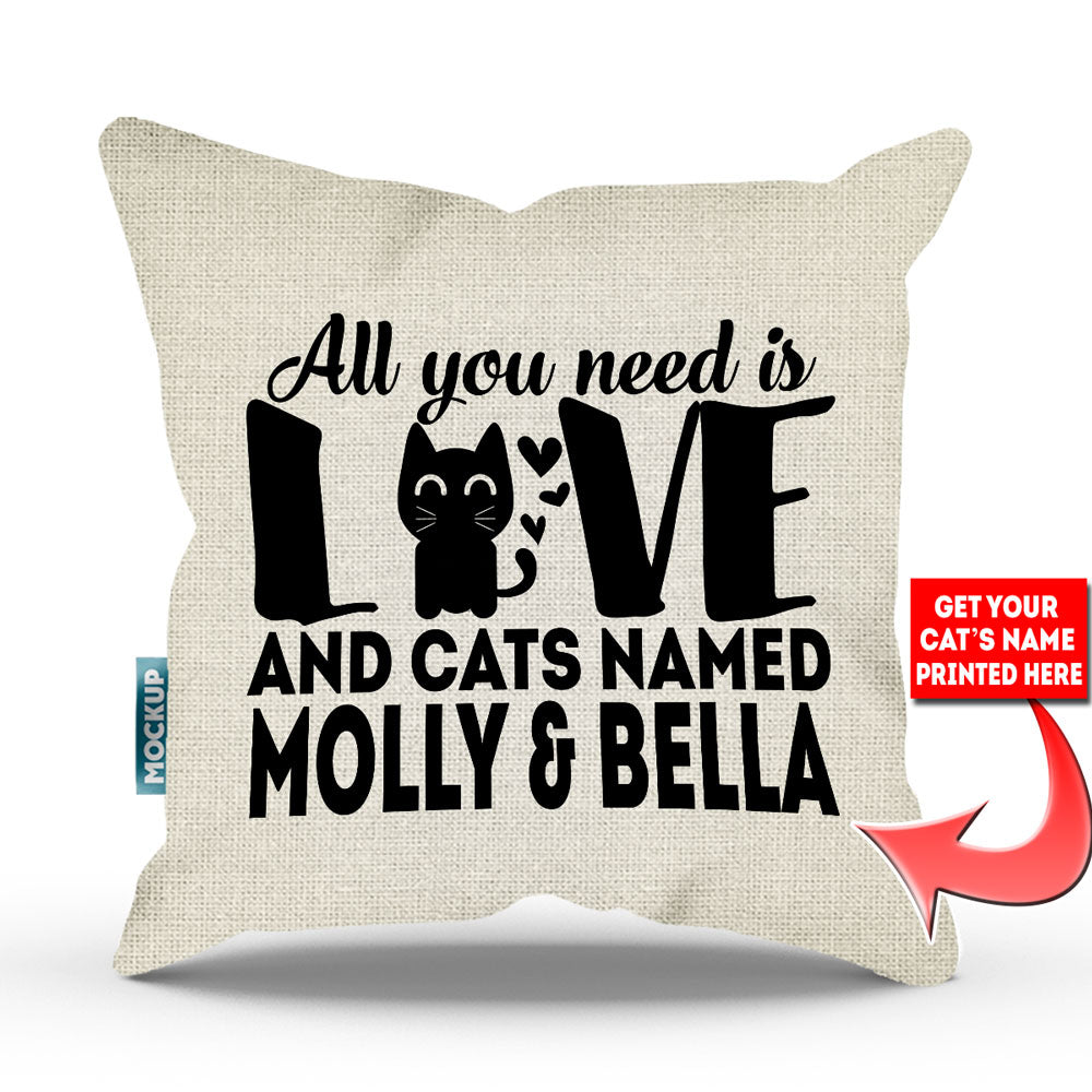 burlap colored pillow with text "all you need is love and cats named molly and bella"