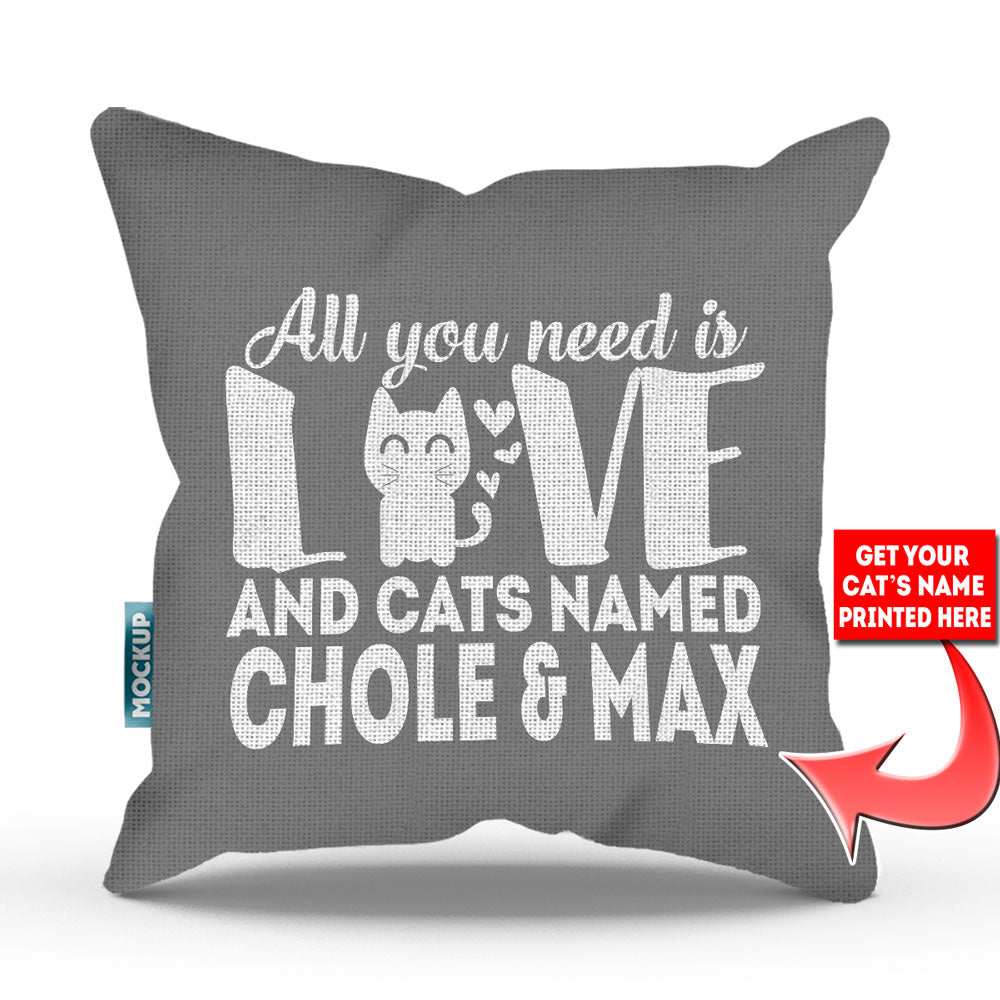 grey colored pillow with text "all you need is love and cats named chloe and max"