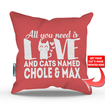 pink colored pillow with text "all you need is love and cats named chloe and max"