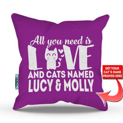 purple colored pillow with text "all you need is love and cats named lucy and molly"