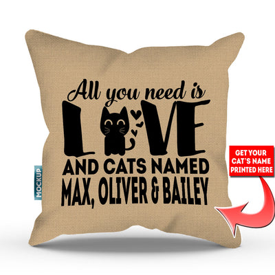 tan colored pillow with text "all you need is love and cats named max, oliver, and bailey"