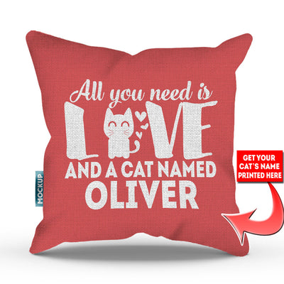 pink colored pillow with text "all you need is love and a cat named oliver"