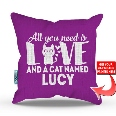 purple colored pillow with text "all you need is love and a cat named lucy"
