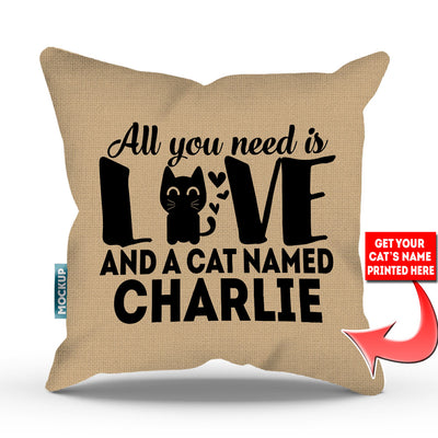 tan colored pillow with text "all you need is love and a cat named charlie"
