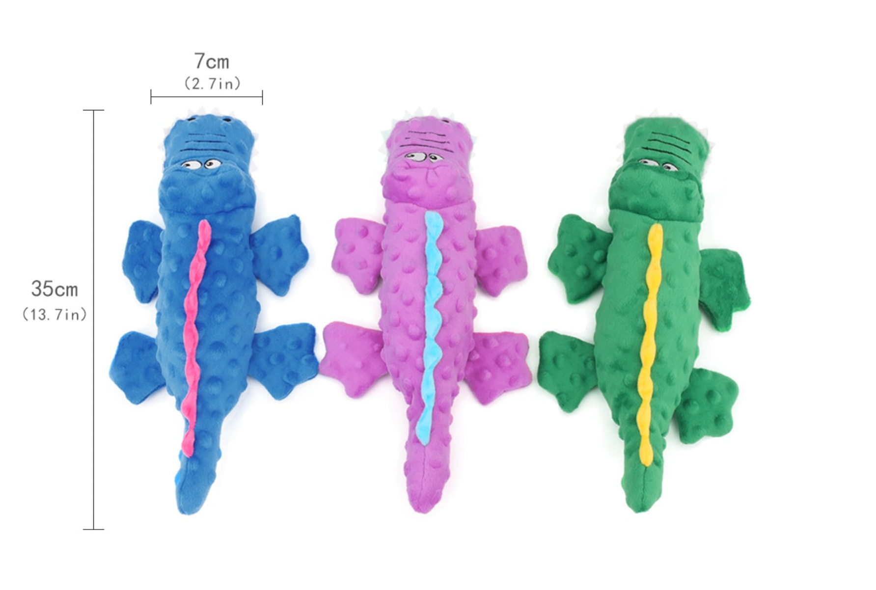 three crocodile-shaped dog toys, colored blue, pink, and green