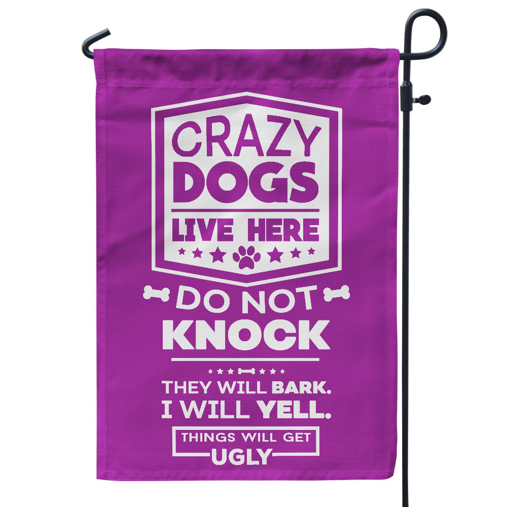 purple garden flag with text "crazy dogs live here, do not knock, they will bark, I will yell, things will get ugly"