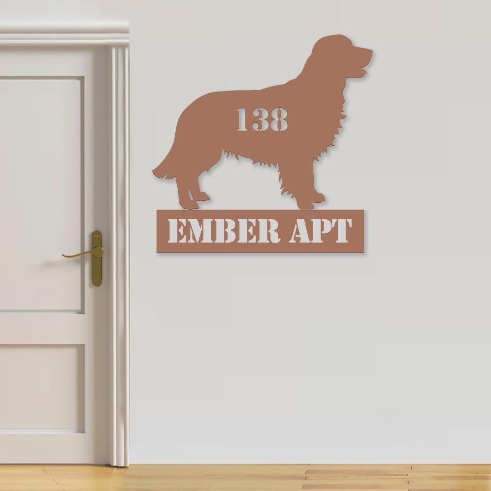 dog themed pink metal sign with text "one hundred thirty eight ember apt"