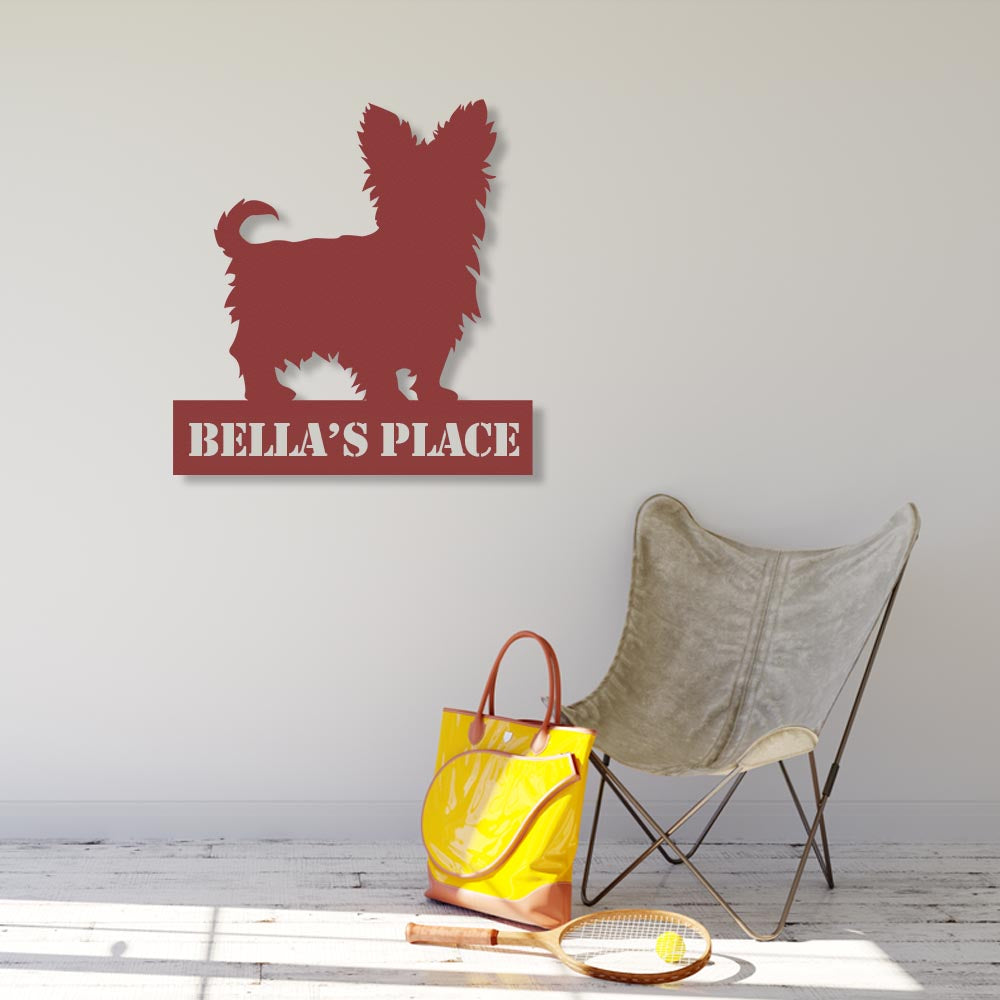 dog themed red metal sign with text "bella's place"